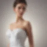 Elegant white bandeau dress on a mannequin