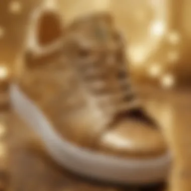 A close-up of intricate glitter detailing on gold sneakers