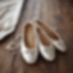 Elegant pearl slippers on a vintage wooden surface