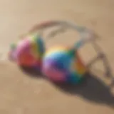 Vibrant tie dye push up bikini displayed on a beach